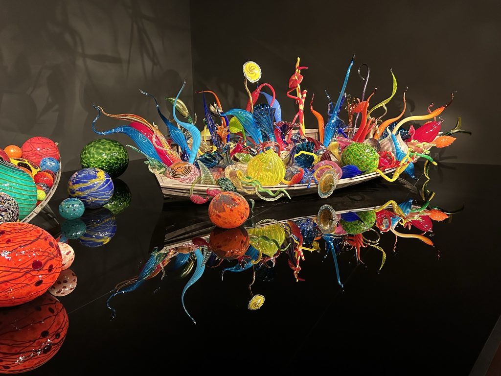 Chihuly Ikebana boat full of glass shapes