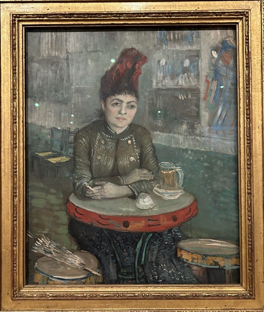 Woman in a bar painting by Van Gogh in the Van Gogh Museum in Amsterdam