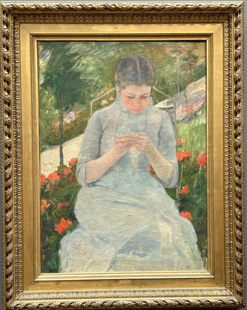 Painting of a young girl by Mary Cassatt at the Musee d'Orsay in paris