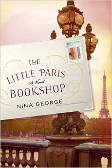 The cover depicts a vintage postcard with the Eiffel Tower and a Parisian bridge. Soft, warm hues give it a cozy, inviting feel, perfectly matching the novel's setting.