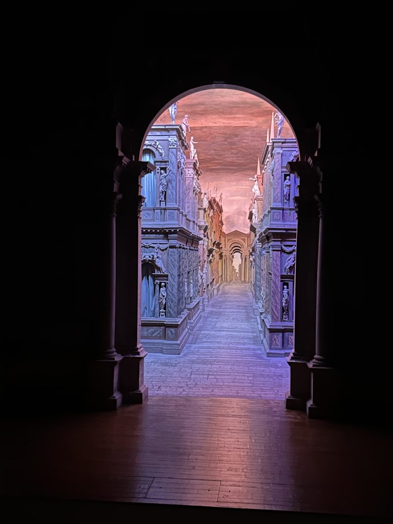 Looking through an archway at the Teatro Olimpico in Vicenza, Italy