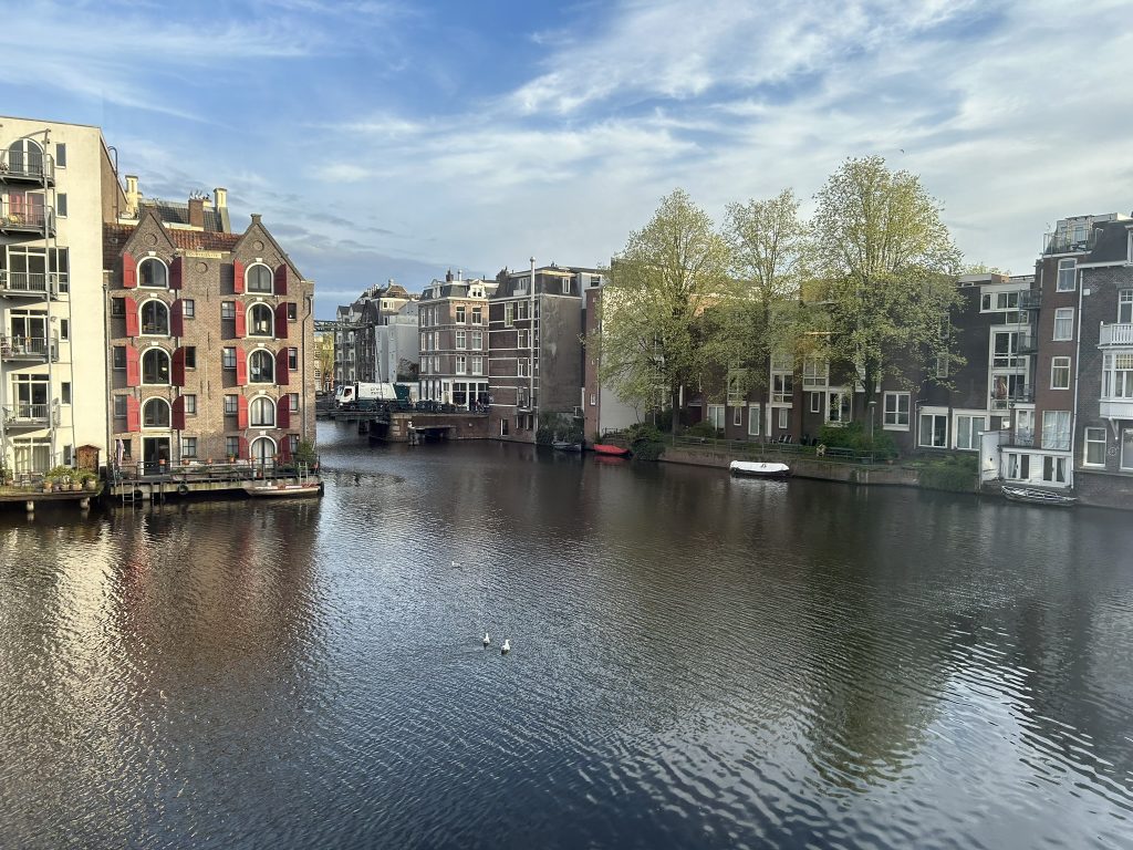 View of canals from the window of a room at the Holiday Inn Express - city Hall in Amsterdam