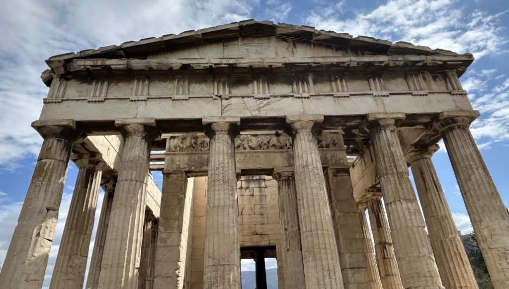 Front view of the columns in the stunning Greek Temple of Hephaestus in Athens, which is part of the Agora of Athens and accessible with a Combo ticket to the archaeological sites in Athens