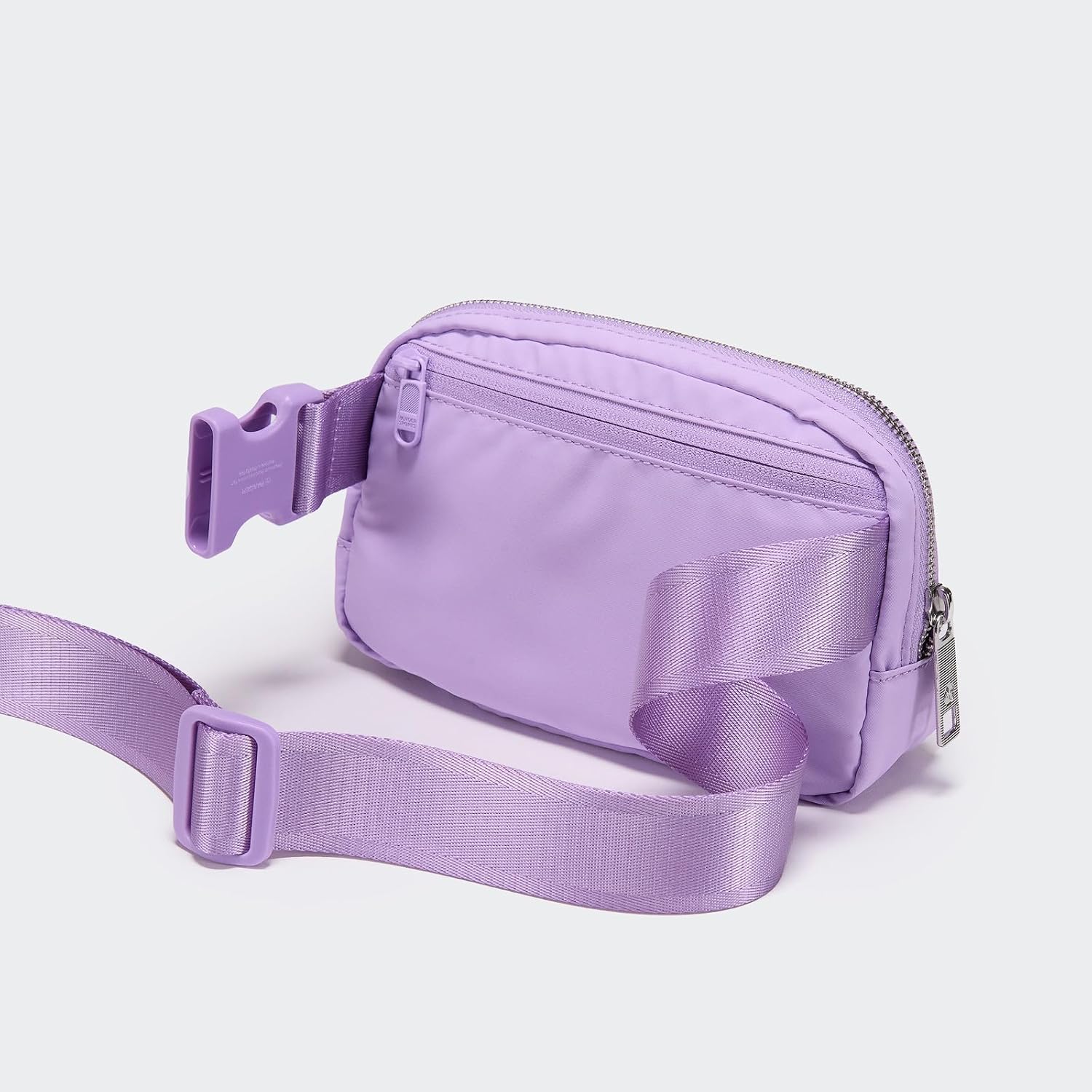 Close-up of a pale purple cross-body bag.