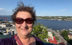 Carol Cram on Dufferin Terrace overlooking St. Lawrence River in Quebec City