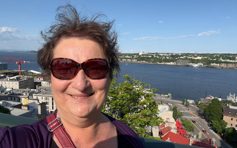 Carol Cram on Dufferin Terrace overlooking St. Lawrence River in Quebec City