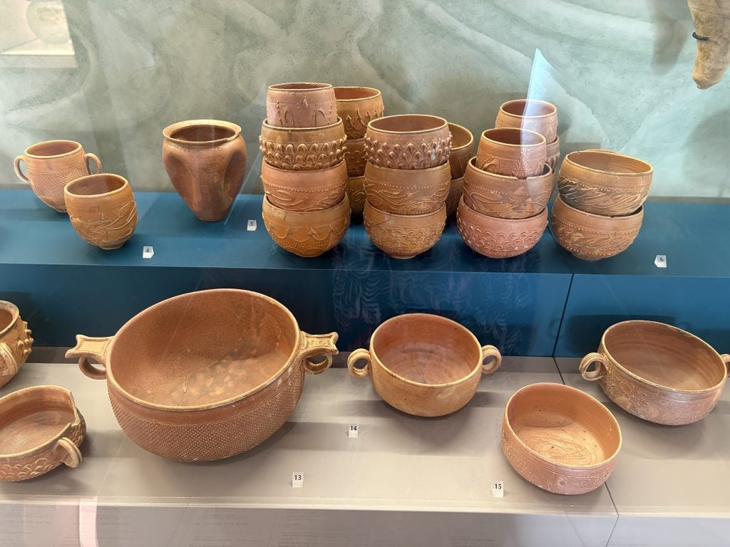 Collection of pots that look brand new but are over 2000 years old on display at the Musée Départemental Arles Antique (Museum of Ancient Arles and Provence)