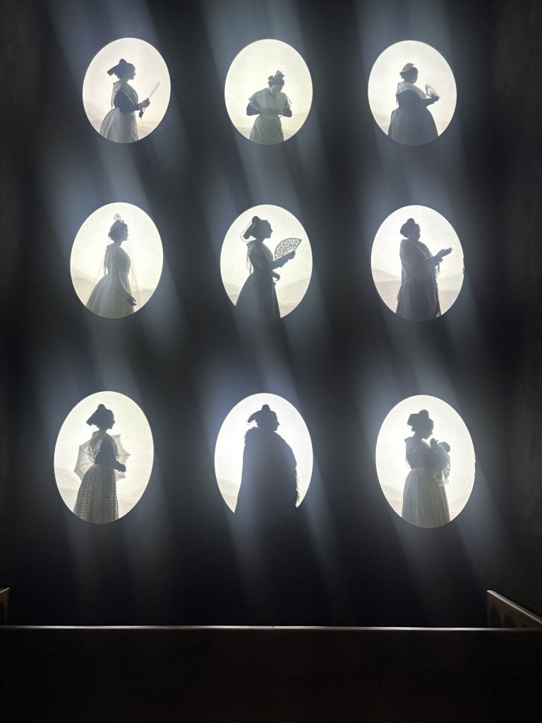Second view of Nine oval views of women dressing in Arlesieene costume  on display at the Musée de la Mode et du Costume 