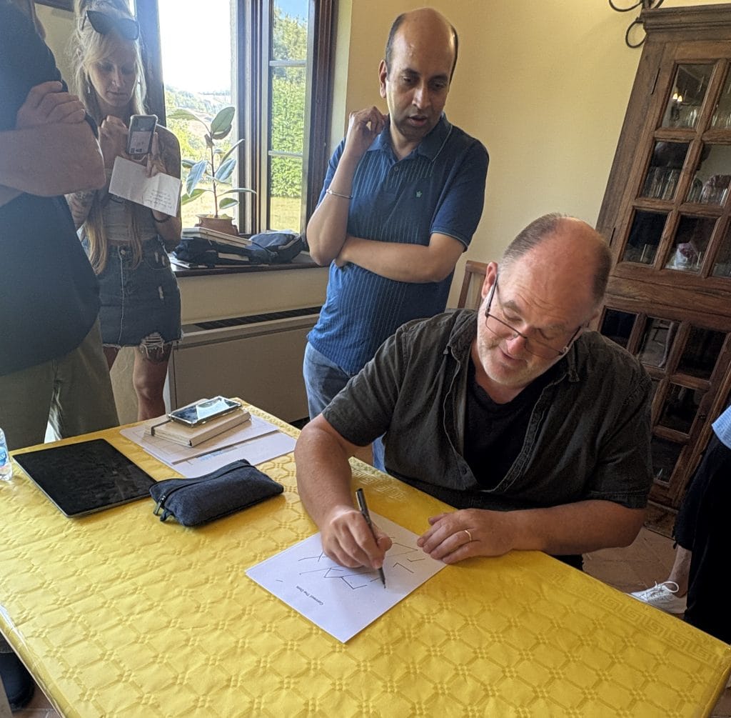 Rod Moore, workshop leader, demonstrates for participants in an Italiana Tours retreat