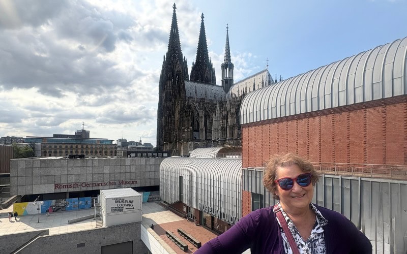 Carol Cram at Museum Ludwig with Cologne Cathedral in the background