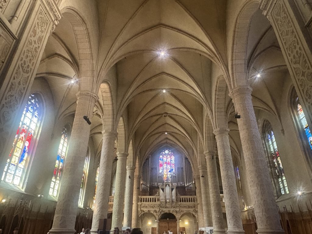 Columns and stained glass in the interior of the Notre Dame Cathedral in Luxembourg