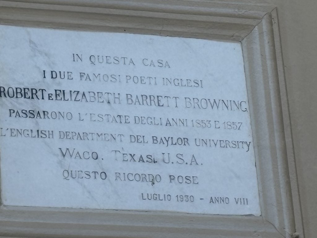 Plaque on a building in Bagni di Lucca stating that Robert & Elizabeth Bartrett Browning lived there in 1857