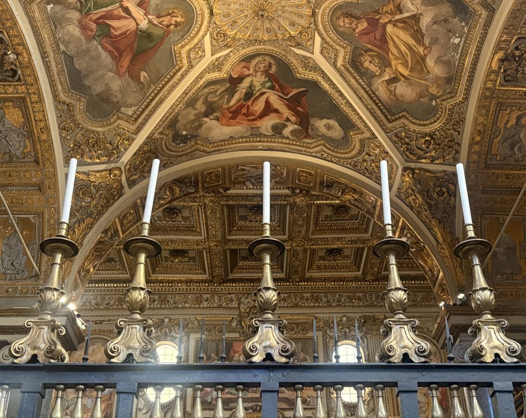 Candlesticks and ornate baroque ceiling at Santa Maria Maggiore taken  on a Photography Tour in Rome with Rome Photo Fun Tours.