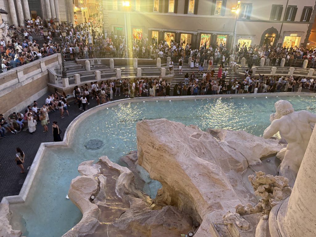 View of the trevi fountain and crowds from the Palazzo Poli in Rome, site of thew Great Opera Arias Concert
