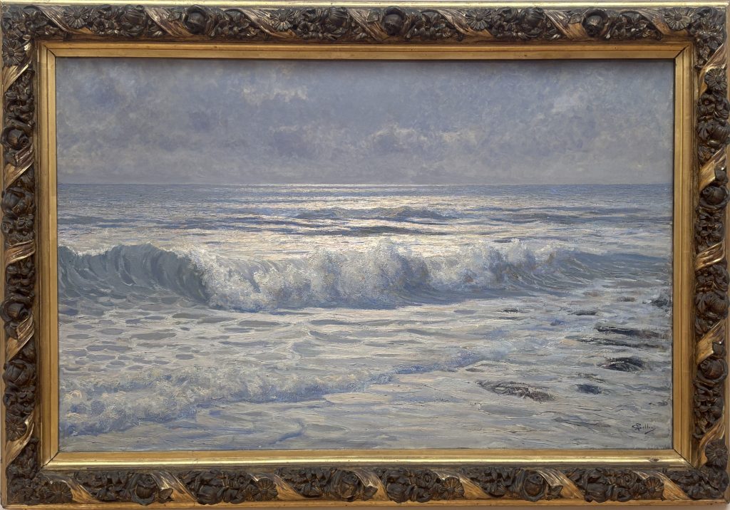 Painting called Mareggiata of sunlit ocean waves by Giorgio Belloni and painted in an early 20th century impressionist style by Amaedeo Bocchi in the Galleria d’arte moderna Ricci Oddi in Piacenza