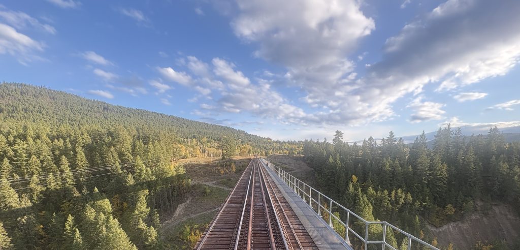 Train tracks going over a high bridge en route to northern BC on the Rocky Mountaineer Rainforest to Goldrush journey