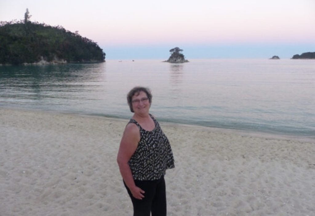 Carol at sunset near Torrent Bay Lodge in Abel Tasman National Park in New Zealand