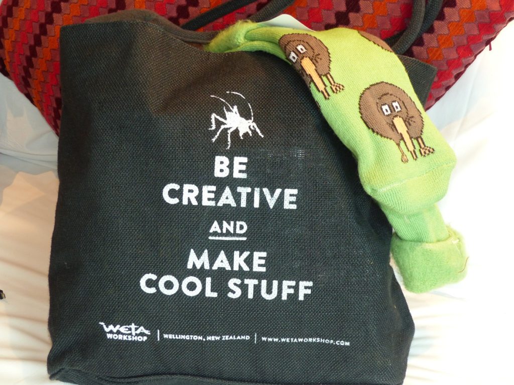 Purchase of a cool bag that says Be Creative and Make Cool Stuff purchased at the Weta Workshop, one of the sites to see during a recommended one visit to Wellington