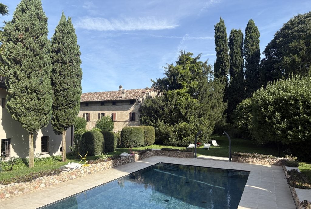 Beautiful country hotel with pool and cypress trees in Italy